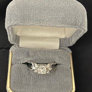 Custom diamond engagement ring set in white gold. GIA certified, appraised